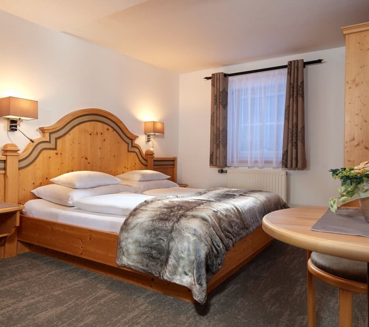 Komfortable Zimmer für 1 bis 3 Personen in der Pension Klinglhub in Flachau